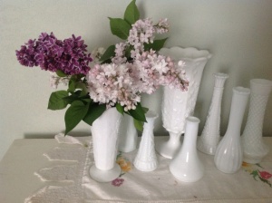 Assorted Lilacs in milk glass vase. 